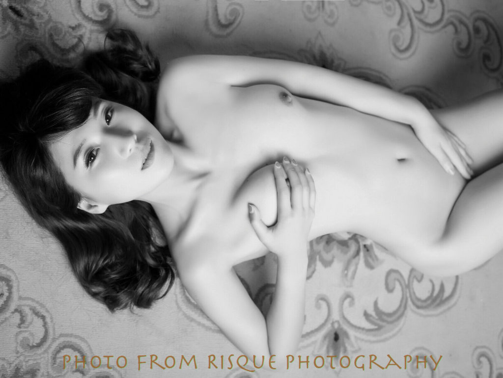 Modern, yet Modest Nude Woman Lying Down on Carpet B&W - Risque Art Gallery